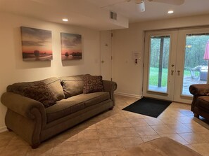 Living area with doors to private patio