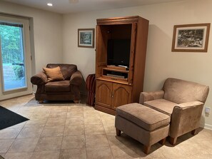 Living area with doors to private patio