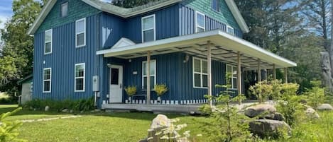 Big Blue exterior with wrap around covered porch