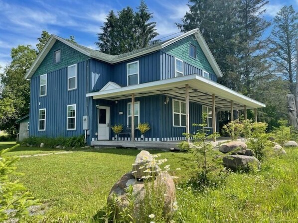 Big Blue exterior with wrap around covered porch