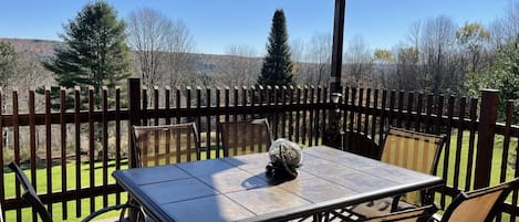 Big Sky outside dining on covered balcony