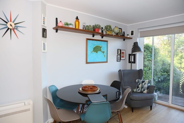 Dining area with seating for 6 - plus the most comfortable reading nook in existence!