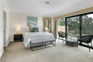 Main bedroom overlooks the Botanic Gardens. Stunning views from the top floor.