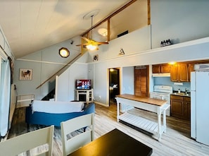 The living room with 2 story loft