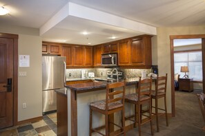Room,Indoors,Flooring,Kitchen Island,Furniture