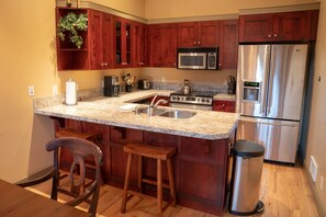 Room, Indoors, Furniture, Kitchen Island, Oven