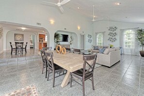 Experience the epitome of open-concept living with two dining spaces seamlessly integrated into a spacious living area.