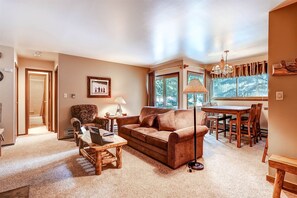 Comfortable sitting area within living room that converts to a sofa bed