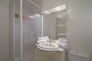 Get ready for your day in the lovely bathroom.