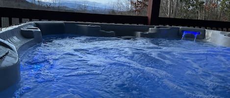 Enjoy spectacular views while relaxing in hot tub on back deck