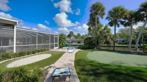 Backyard Area w/ Putting Green & Corn Hole