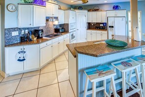 Create your favorite meals in this spacious open-concept kitchen.