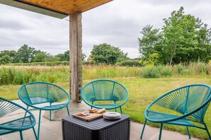 1 Long Barn, Henham: Garden patio with outdoor furniture