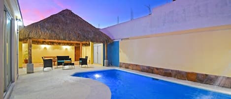 A beautiful pool and palapa lounge to enjoy - shared between only 3 units