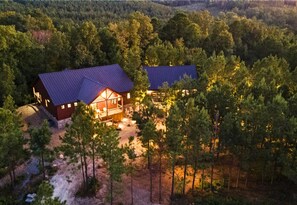 Twilight serenity at your forest retreat. Unwind with nature's symphony as dusk falls