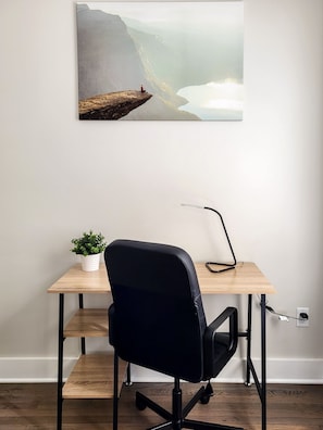 Workspace with desk and chair for remote work/study.