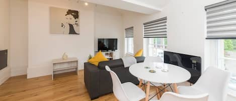 The open plan living & dining area shows you how smart this apartment is