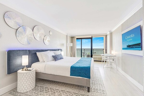 Luxurious bedroom with a king-sized bed, perfect for a restful night's sleep. 

