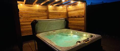 Enjoy Your Private Hot Tub in the Large Backyard.