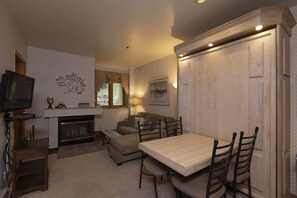 Living room featuring a fireplace.