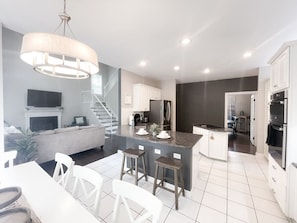 Kitchen Opens to the Living Room.