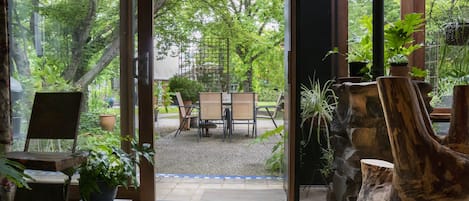 Looking out to shady courtyard with BBQ