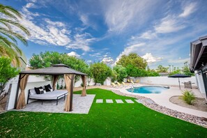 Backyard Gazebo And Sport Pool With Lounge Chairs