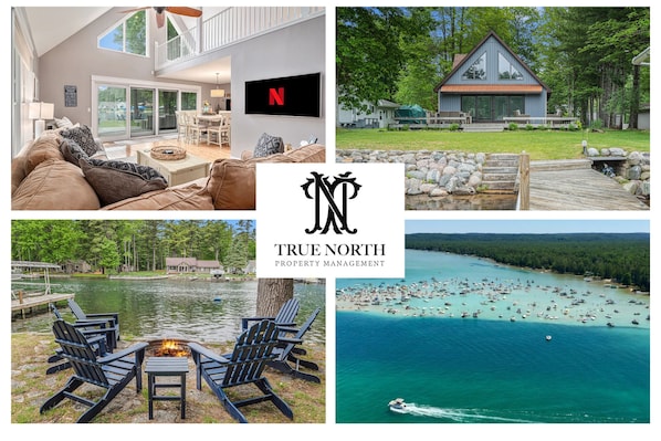 THE TRUE NORTH presents... TORCH RIVER RETREAT! Waterfront gem with private dock, Sandbar access, pet-friendly comfort, and space for 10.