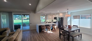 A complete open kitchen, dinning room and living room