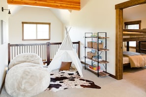 Loft area features games and playful spaces for all ages!