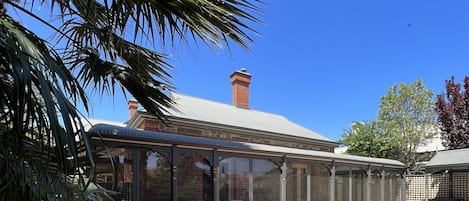 Enjoy the heritage return verandah, lounge and dining area 