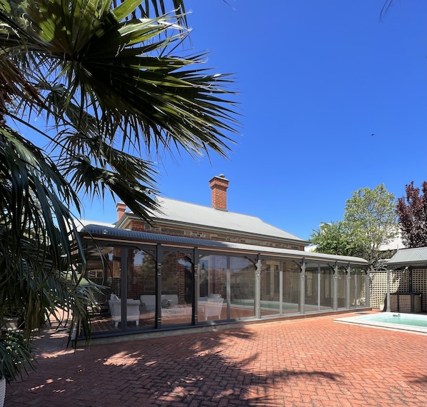 Enjoy the heritage return verandah, lounge and dining area 