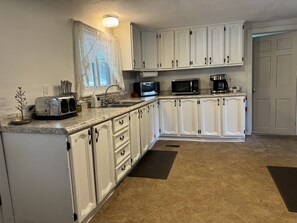 Kitchen with 1st floor bath beyond