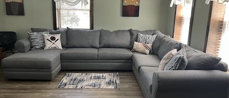 Roudtripper large sectional couch in main living room.