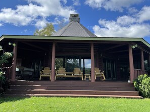 Rear covered deck overlooking pond