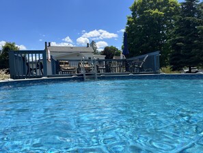 Above ground pool in backyard