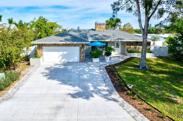 Easy parking with a large driveway accommodating 4 vehicles at this beautiful home.