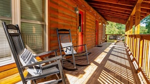 The Garnet Owl is one of two adjoining townhomes in this hand stacked, solid-log cabin that offer a unique combination of classic, mountain cabin charm with all of the modern amenities.