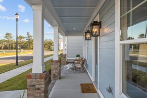 Front Porch with view of Traders Lake and wetlands