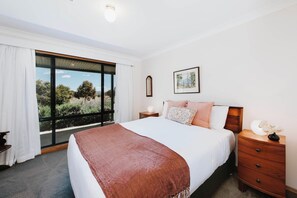 The second bedroom also features a queen-size bed with ample storage for your belongings.