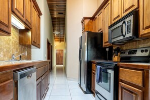 Well appointed galley kitchen facing main hallway