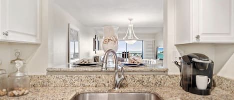 Kitchen sink area facing the view of the ocean