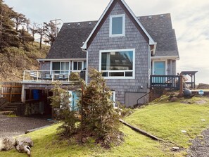 Anchor Court Beach House, balcony on left, patio off living rm on the right.