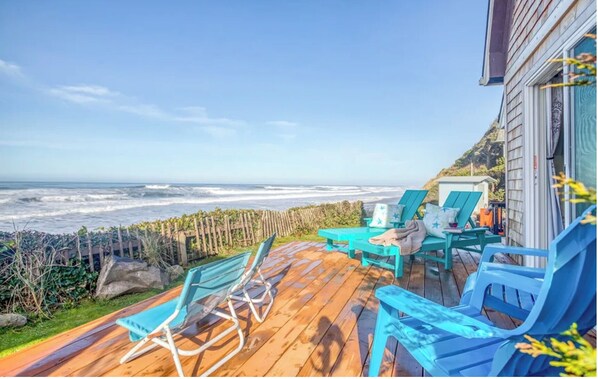 Deck off Living Room, over looking the Pacific Ocean. with steps to the beach.