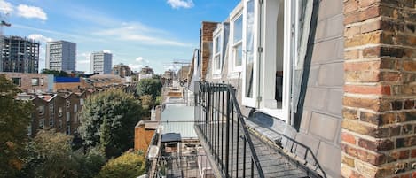 Step out into your outside space for views of the treetops of West London