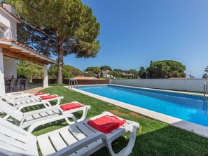 Sky, Plant, Swimming Pool, Tree, Building, Shade, Outdoor Furniture, Urban Design, Leisure, Grass