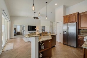 fully stocked kitchen and open concept living space