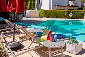 Relax by the pool. We have the toys!