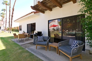 Spacious outdoor living, with both lounge and dining areas