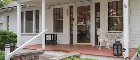 A delightful farmhouse with the original country porch to welcome you.